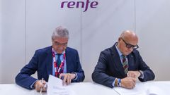 Isa�as T�boas y Jos� Manuel Baltar, firmando el convenio.