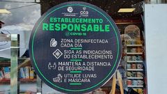 Los locales comerciales y de hosteler�as instalaron letreros para informar a los clientes sobre las medidas de prevenci�n contra los contagios