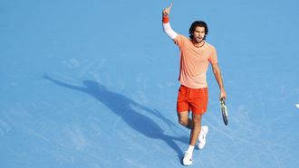 Alcaraz celebra un punto durante el partido de octavos del ATP de Jap&oacute;n.