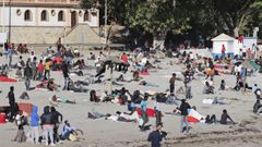 Migrantes en la playa del Trampol�n, este martes.