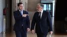 El presidente del PP en Castilla y Le�n, Alfonso Fern�ndez Ma�ueco, a la izquierda, y el portavoz de Vox en las Cortes, Carlos Poll�n, a su llegada a la rueda de prensa en la que detallaron el acuerdo de Gobierno