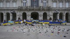 Concentración contra la guerra de Ucrania en la plaza de María Pita (A Coruña)