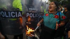 Una mujer participa el pasado 10 de junio en una manifestaci�n para exigir justicia por Nathaly Mafla, una estudiante universitaria de 20 a�os, y Monika Silva, una activista de origen polaco, cuyos cuerpos fueron hallados sin vida.