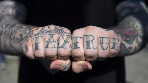 Un hombre tatuado, en la Convenci�n de Tatuaje de Londres, Reino Unido