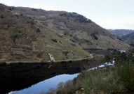 <span lang= es-es >San Miguel de Portotide</span>. Esta iglesia, mencionada ya en un documento del a�o 976, se hallaba en una zona anegada por el embalse de Os Peares y estuvo abierta al culto hasta entonces. 