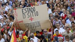 Asistentes a la manifestaci�n con motivo del D�a de Ceuta en Oviedo, convocada este mi�rcoles ante todos los ayuntamientos de Espa�a