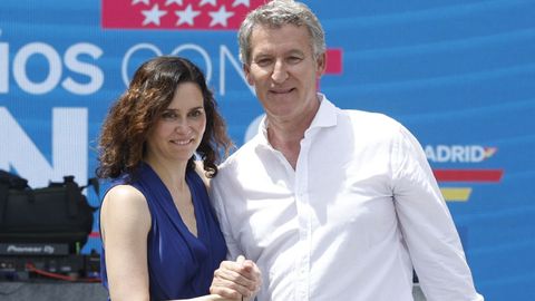 Feijoo y Ayuso durante al acto celebrado este domingo en Madrid por el Partido Popular.