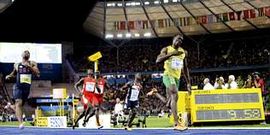 Usain Bolt entr� triufante en la l�nea de meta estableciendo una nueva plusmarca mundial de la distancia que pasar� a los anales de la historia