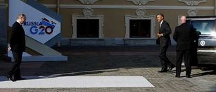 Putin se mostr� distante al saludar a Barack Obama, quien lleg� en su famosa limusina �La Bestia� al palacio Constantino.