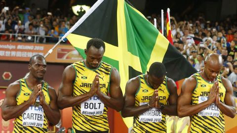 Nesta Carter, a la izquierda, junto a Bolt