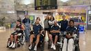 Pacientes de la Unidad de Lesionados Medulares del Chuac, en el aeropuerto de Alvedro antes de embarcar para participar en Barcelona en los primeros Juegos Deportivos Intrahospitalarios Activa T