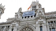 Cartel de bienvenida a los refugiados, en el a�o 2016, en Madrid
