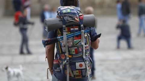 
A pilgrim with a backpack on his back in Santiago.