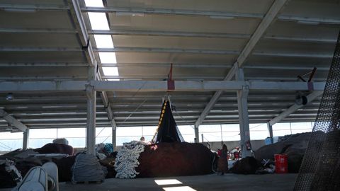 Nave de rederas de Agui�o, de cuya cubierta vol� una plancha