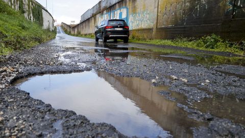 Baches en la carretera que va de Alfonso Molina hacia el colegio Maristas