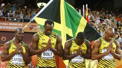 Nesta Carter, a la izquierda, junto a Bolt
