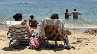 Xente na praia.