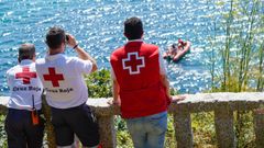 Integrantes de la Cruz Roja participan en las labores de b�squeda de los desaparecidos