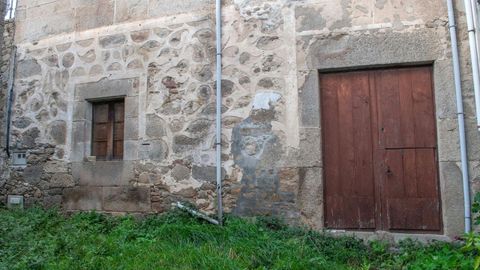 La misma fachada de la localidad de Naz antes de la restauracin del esgrafiado