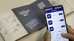 Aplicaci�n m�vil que gu�a el juego junto a la credencial escapista