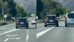 Momento en el que el acompa�ante de un veh�culo pasa la cerveza al conductor del otro en la AC-550