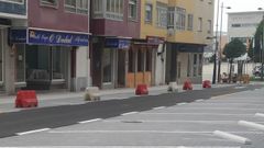 Imagen de archivo de la calle Rosal�a de Castro en obras. Al fondo, a la izquierda, est� el cajero del BBVA