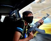 Un joven rebelde, en el transcurso de un combate en las cercan�as de la ciudad de Alepo.