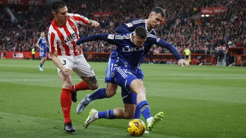 Abel Bretones y Djuka, durante el derbi asturiano