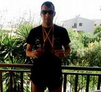 El atleta con sus dos metales logrados en los 1.500 y 800 metros.