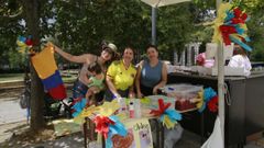 Tres de las organizadoras de la fiesta organizada por la comunidad colombiana en Ourense