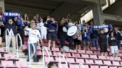 Aficionados del Boiro celebran la conseci�n de la plaza de la previa de la Copa del Rey en el estadio de San L�zaro, donde derrot� al Ponteareas en junio