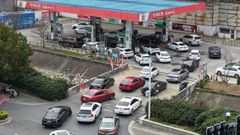 Colas para repostar en una gasolinera de Sinopec, la petrolera estatal china.