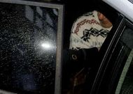 Jos� �ngel C., en el interior de un coche policial poco antes de declarar en los juzgados.