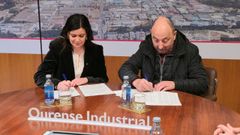 Lara Gonz�lez, directora de zona Ourense-Centro de Abanca y Jos� Antonio Rodr�guez Araujo, presidente de la Asociaci�n de Empresarios Pol�gono San Cibrao