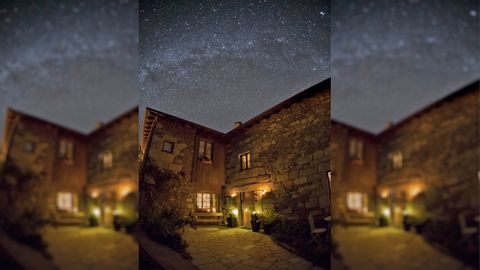 La casa rural Eido das Estrelas con la Va Lctea brillando sobre ella