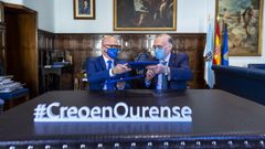 Jos� Manuel Baltar y Manuel Reigosa, en la firma del convenio.