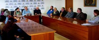 Representantes de criadores y cooperativas se reunieron ayer en el consistorio para tratar la cita del 22.