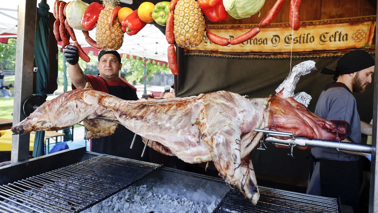 Pulpo, música y procesión en el día central de los festejos de Santa Rita
