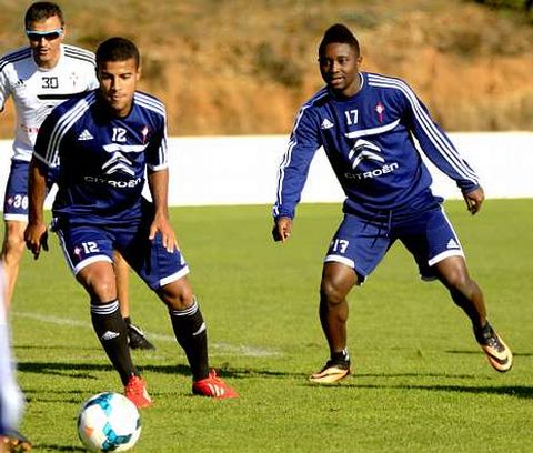 Madinda, con Rafinha y Luis Enrique, antes de retirarse en el entrenamiento de ayer.