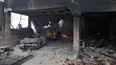 Infierno en Mel�n: recogiendo los escombros de una vida