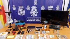 Material y dinero incautado en el inmueble