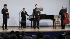 Irina Moriatova con sus hijos Mija�l y Evgueni y marido Valeri en uno de los numerosos conciertos navide�os que el cuarteto ha ofrecido en Monforte